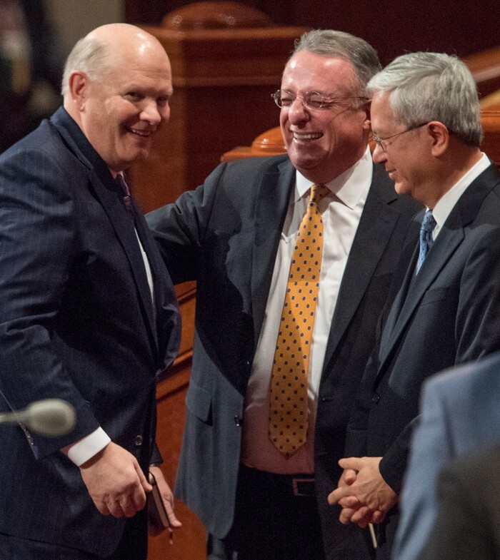 (Rick Egan  |  The Salt Lake Tribune)          Elder Dale G. Renlund shares a laugh with Elder Gerrit W. Gong and Elder Ulisses Soares, after the Saturday morning session of the188th Annual General Conference in Salt Lake City,  Saturday, March 31, 2018.