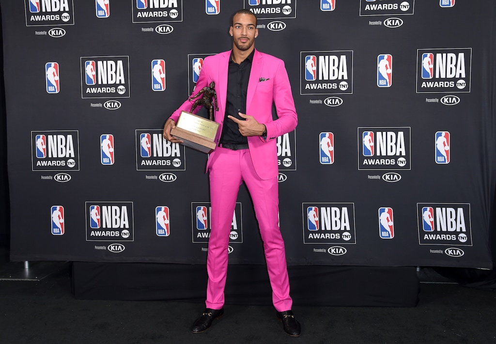Rudy Gobert, of the Utah Jazz, poses in the press room with the defensive player of the year award at the NBA Awards on Monday, June 25, 2018, at the Barker Hangar in Santa Monica, Calif. (Photo by Richard Shotwell/Invision/AP)