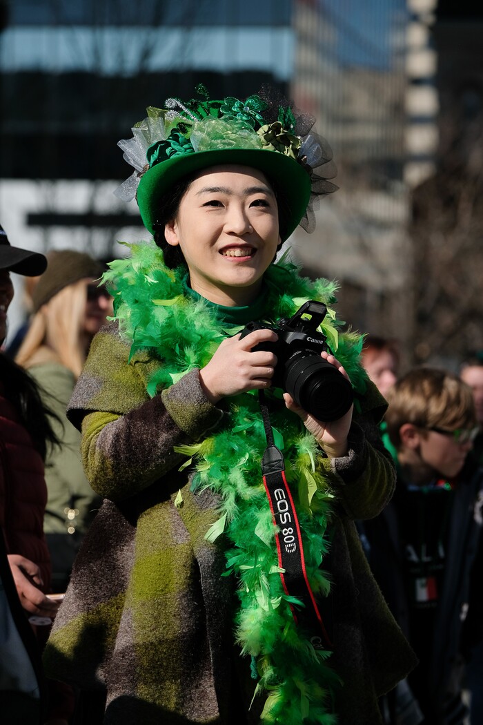 (Francisco Kjolseth | The Salt Lake Tribune) Xiao Ing, takes in the sights as Salt Lake CityÕs Irish community celebrates their 41st annual St. PatrickÕs Day Parade with crowds lining up to take in the festivities.