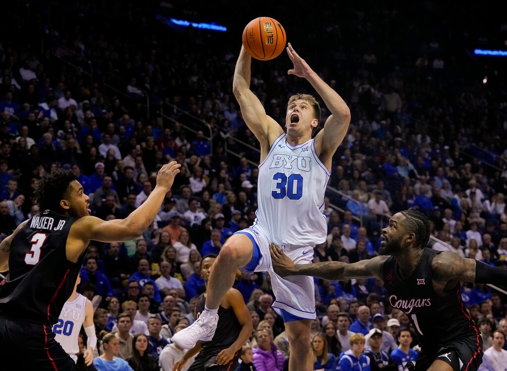 (Bethany Baker  |  The Salt Lake Tribune) Brigham Young Cougars guard Dallin Hall (30) shoots during the game against the Houston Cougars in Provo on Tuesday, Jan. 23, 2024.