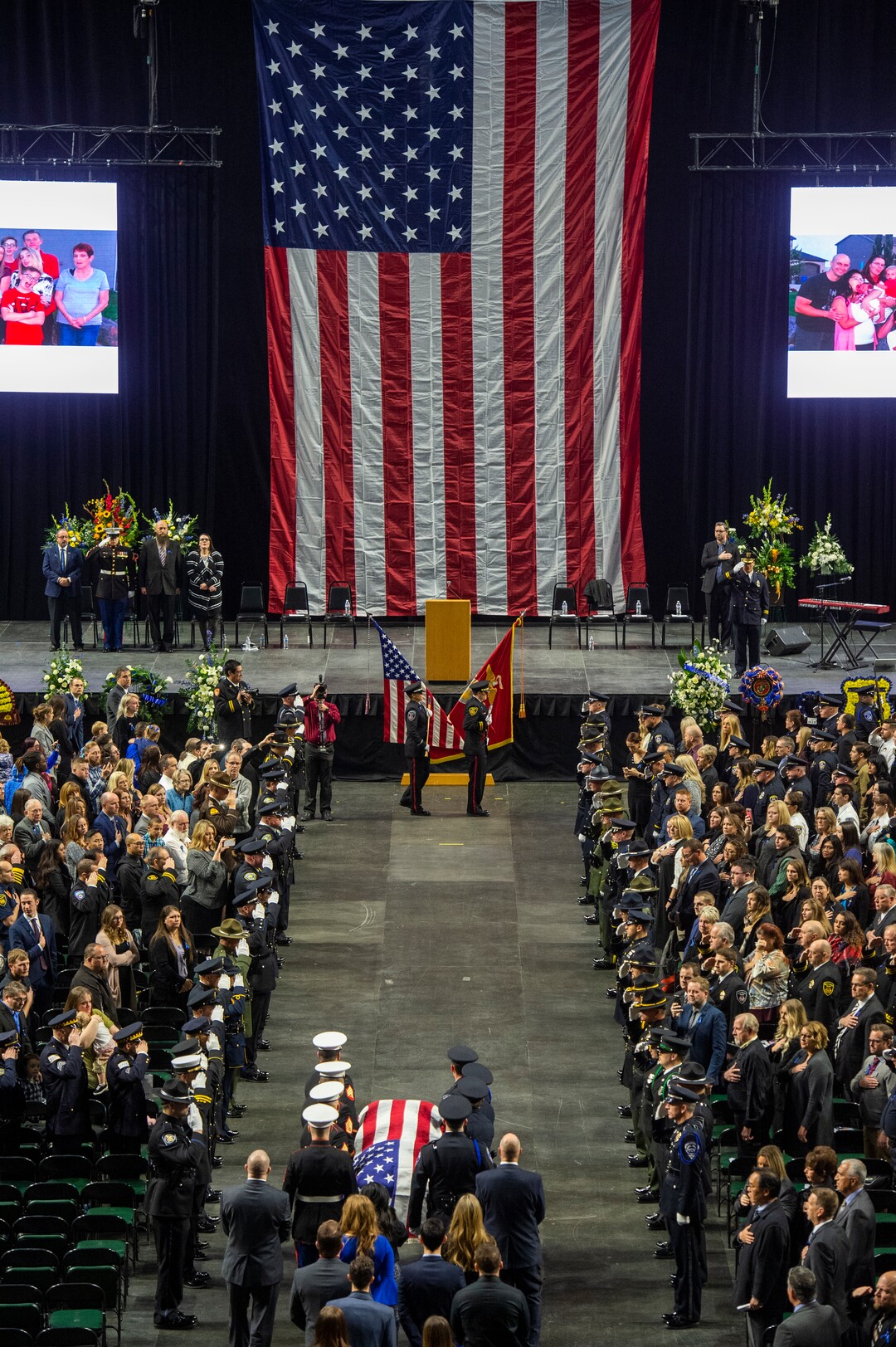 (Rick Egan  |  The Salt Lake Tribune)     The funeral procession enters the Maverik Center for the funeral for South Salt Lake police officer, David Romrell, who died after being struck by a car during a clash with two burglary suspects on Nov. 24. Wednesday, Dec. 5, 2018.