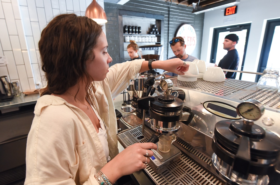 (Francisco Kjolseth  |  The Salt Lake Tribune)  Katie Mansfield prepares an order for a customer at Publik Ed's.