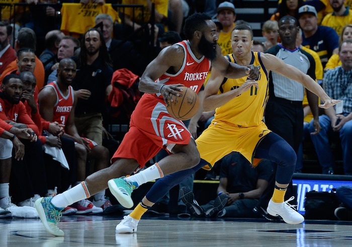 (Francisco Kjolseth | The Salt Lake Tribune) Houston Rockets guard James Harden (13) tries to get past Utah Jazz guard Dante Exum (11) in Game 4 of the NBA playoffs at the Vivint Smart Home Arena Sunday, May 6, 2018 in Salt Lake City.