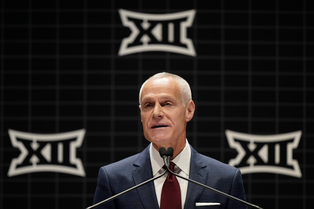 (Charlie Riedel | AP) Big 12 Commissioner Brett Yormark addresses the media during the NCAA college Big 12 women's basketball media day in 2023 in Kansas City, Missouri.