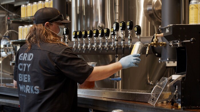 (Ryan Samanka | courtesy photo) A brewery worker draws beer from a tap in "Grid City Beer Works," a documentary by Ryan Samanka, one of the short films in The Salt Lake Tribune's Quarantine Film Festival.