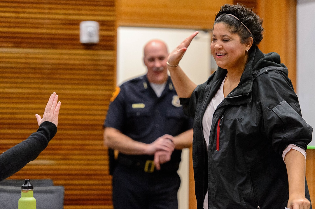 Trent Nelson  |  The Salt Lake TribuneActivist Lex Scott at a meeting of the Community Activist Group, Wednesday January 18, 2017. The CAG meets with police and city representatives every other week. At rear is Salt Lake City Police Chief Mike Brown.