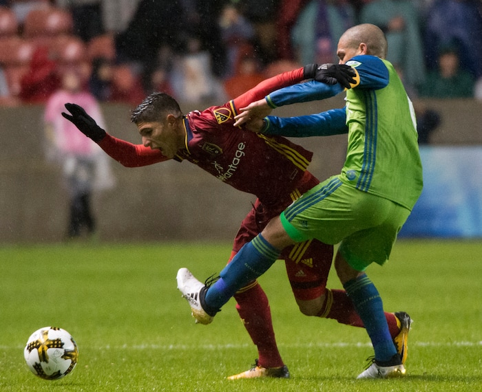 (Rick Egan  |  The Salt Lake Tribune) Real Salt Lake forward Jefferson Savarino (7) goes for the ball along with Seattle Sounders midfielder Osvaldo Alonso (6), in MLS soccer action, Real Salt Lake vs Seattle Sounders, in Sandy, Saturday, September 23, 2017.