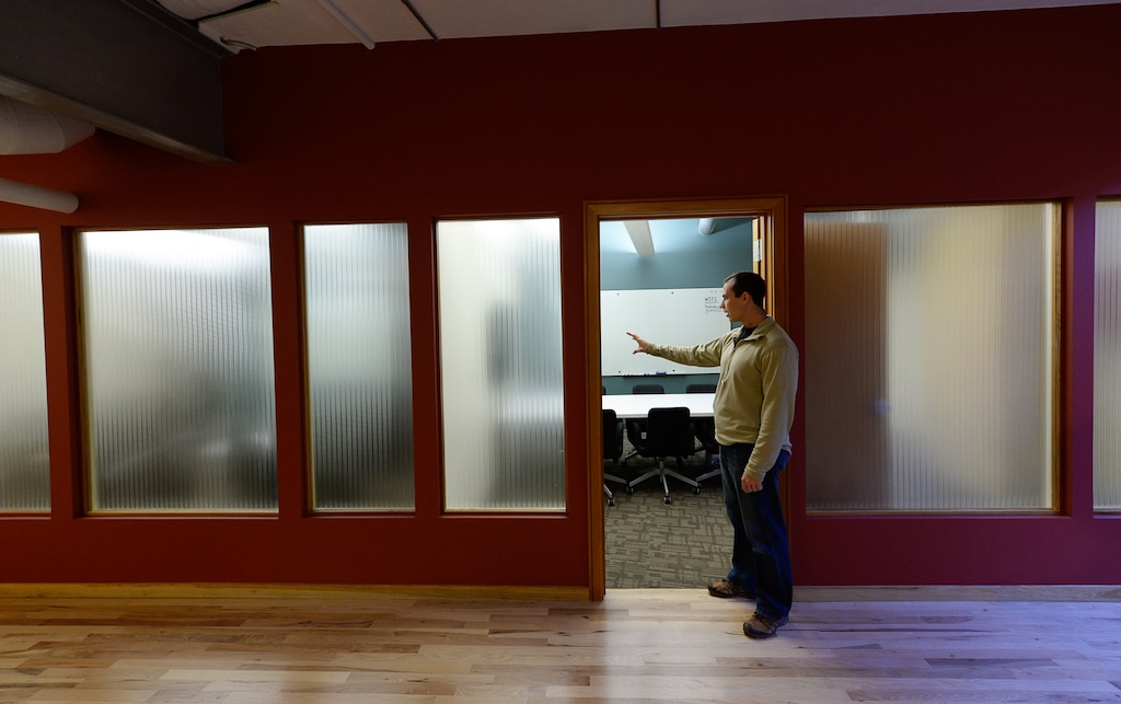 Francisco Kjolseth  |  The Salt Lake TribuneJohn Might, one of the owners of Holodeck, a co-working movable space with 15,000 sq/ftin in downtown Salt Lake City, give a tour of some of the spaces available where different young entrepreneurs share a collaborative workspace and mix. More than half-dozen business incubators have sprung up in Salt Lake City's downtown in recent years, including Holodeck.  They offer inexpensive `co-working' space, where startup companies share offices, support services to save costs.