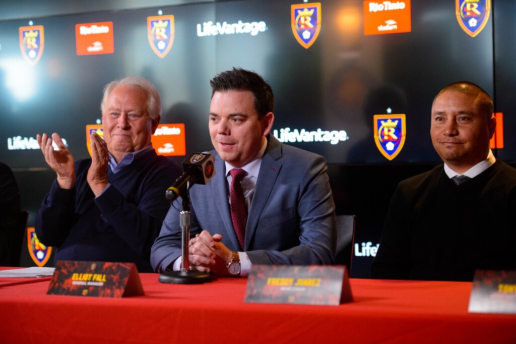 (Trent Nelson  |  The Salt Lake Tribune)Real Salt Lake General Manager Elliot Fall introduces new Head Coach Freddy Juarez during a news conference at Rio Tinto Stadium in Sandy on Tuesday Dec. 3, 2019. At left is team owner Dell Loy Hansen.