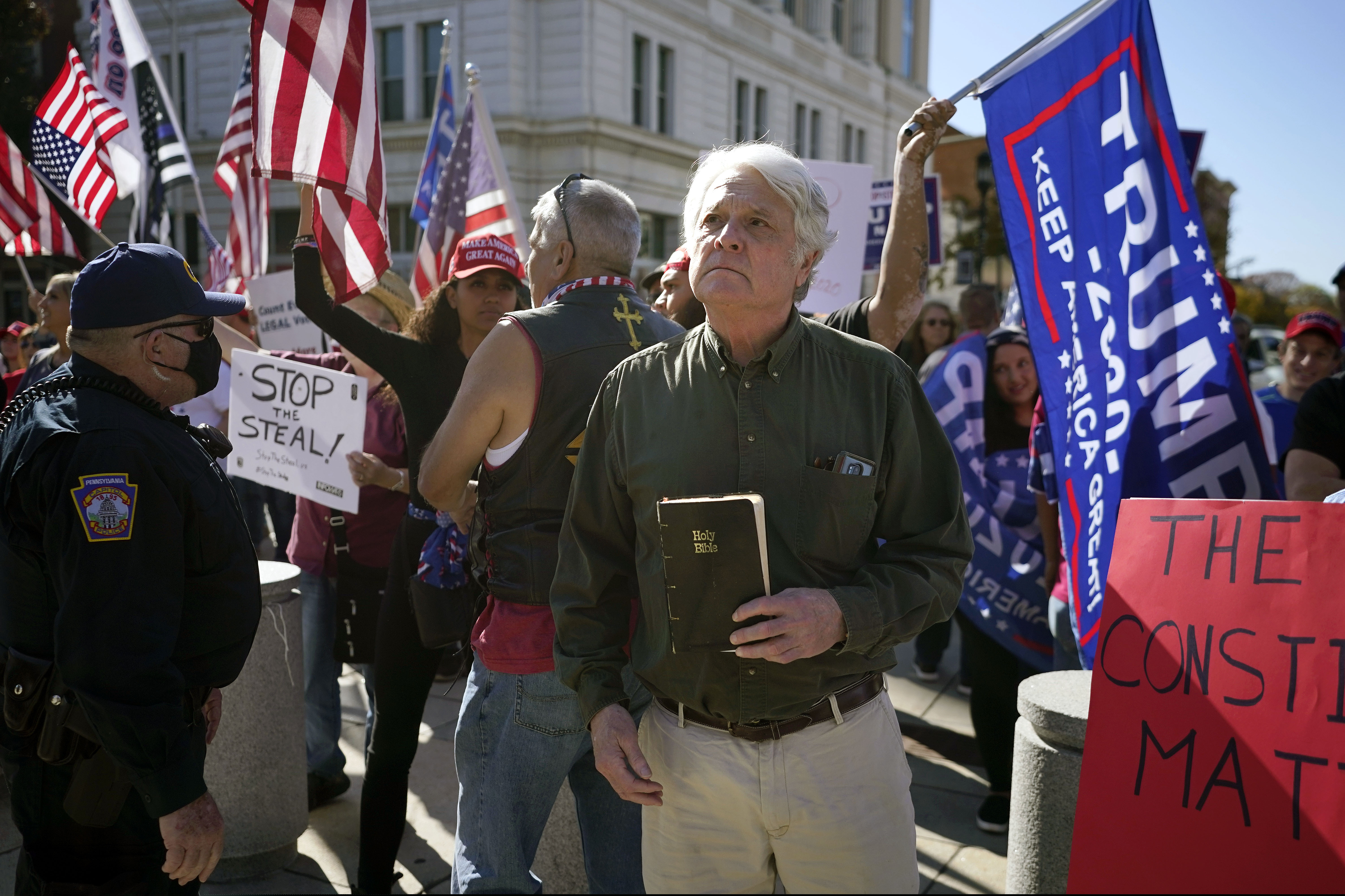 Supporters of President Donald Trump demonstrate outside the Pennsylvania State Capitol, Saturday, Nov. 7, 2020, in Harrisburg, Pa., after Democrat Joe Biden defeated President Donald Trump to become 46th president of the United States. (AP Photo/Julio Cortez)