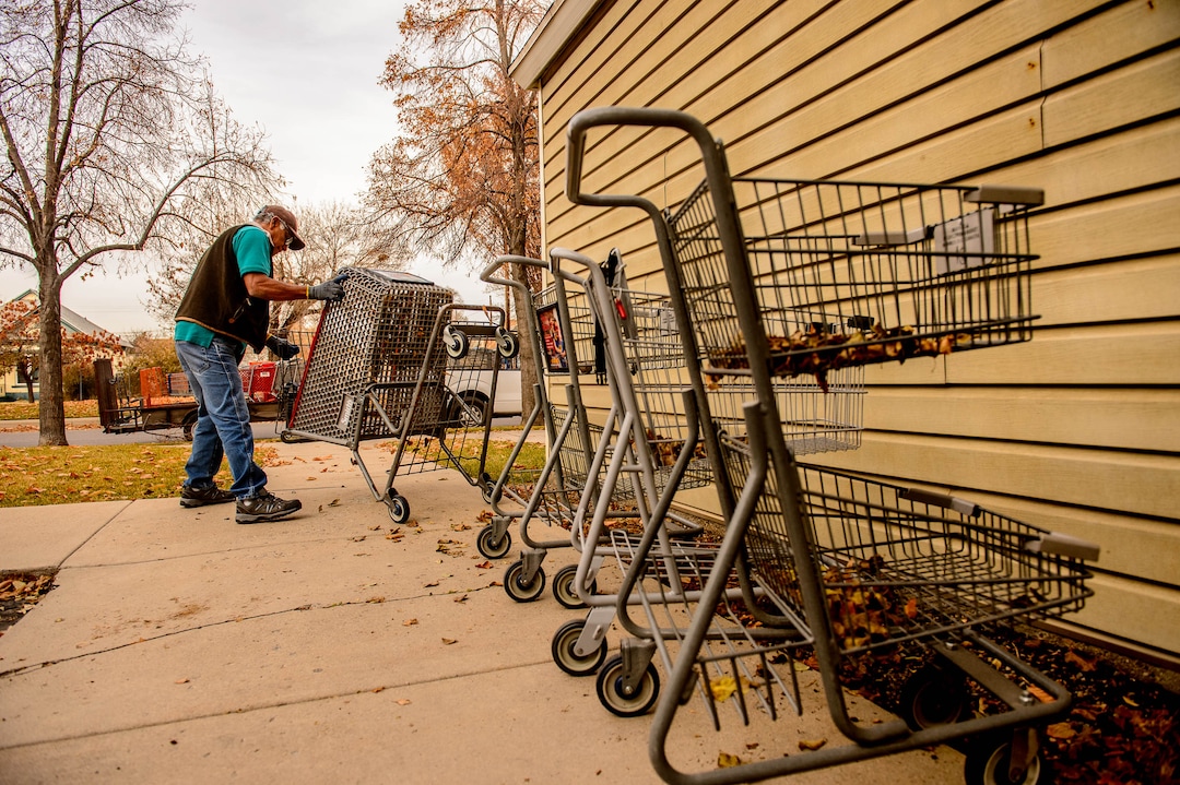 (Trent Nelson  |  The Salt Lake Tribune) Antonio Hernandez collects shopping carts in Salt Lake City on Tuesday, Nov. 19, 2019. Hernandez, an employee of Romac, is assigned to drive around the city and pick up stolen or abandoned shopping carts for return to stores.