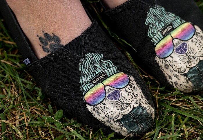 (Leah Hogsten  |  The Salt Lake Tribune)  Shellby McGarrett shows off her love of dogs during the 2017 Strut Your Mutt dog walk and fundraiser to save the lives of homeless pets, October 14, 2017  at Liberty Park. Participants can choose to raise money for Best Friends or for one of hundreds of participating shelters, rescue groups and other animal welfare groups. 