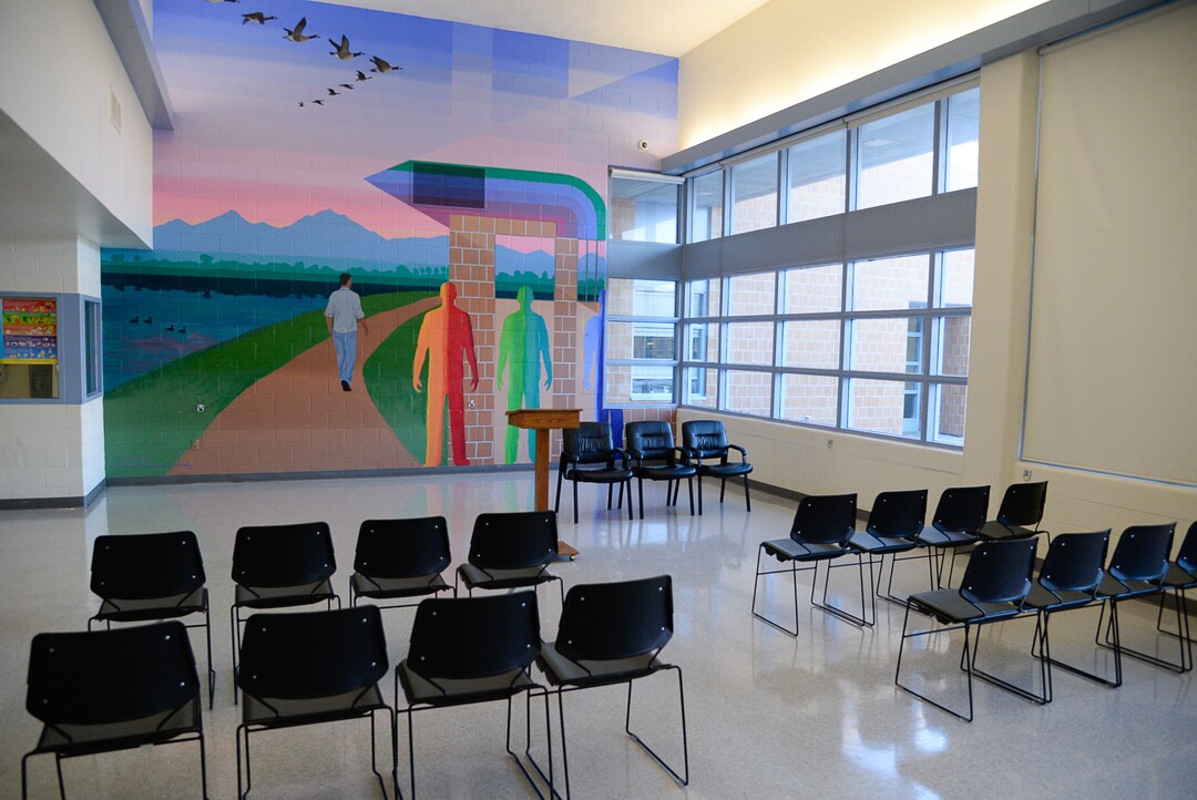 (Francisco Kjolseth  |  The Salt Lake Tribune) Juvenile Justice Services holds a press conference at Decker Lake Youth Center in West Valley City on Wednesday, Jan. 15, 2020, to discuss its success after juvenile justice reforms were passed in 2017. Gov. Gary Herbert was on hand to tour the facility and speak with some of the youth who are being held at the facility. Pictured is the multipurpose room with a mural meant to illustrate the positive transformation of youth working through the juvenile justice system.