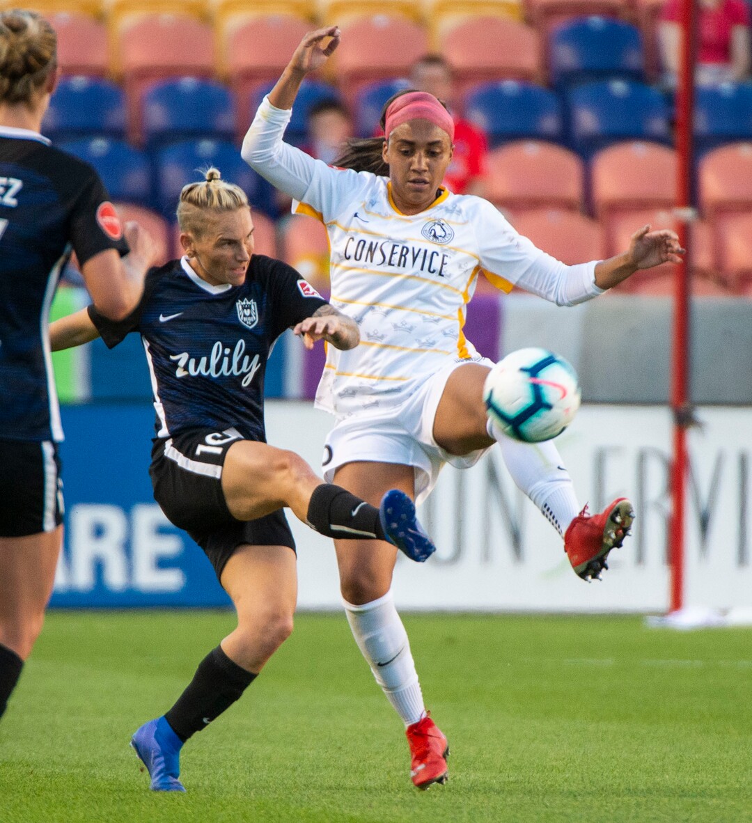 (Rick Egan  |  The Salt Lake Tribune)   Utah Royals FC defender Samantha Johnson (16) goes for the ball along with Seattle Reign FC midfielder Jessica Fishlock (10), in soccer action between Utah Royals FC and Seattle Reign FC in Sandy, Friday, June 28, 2019.