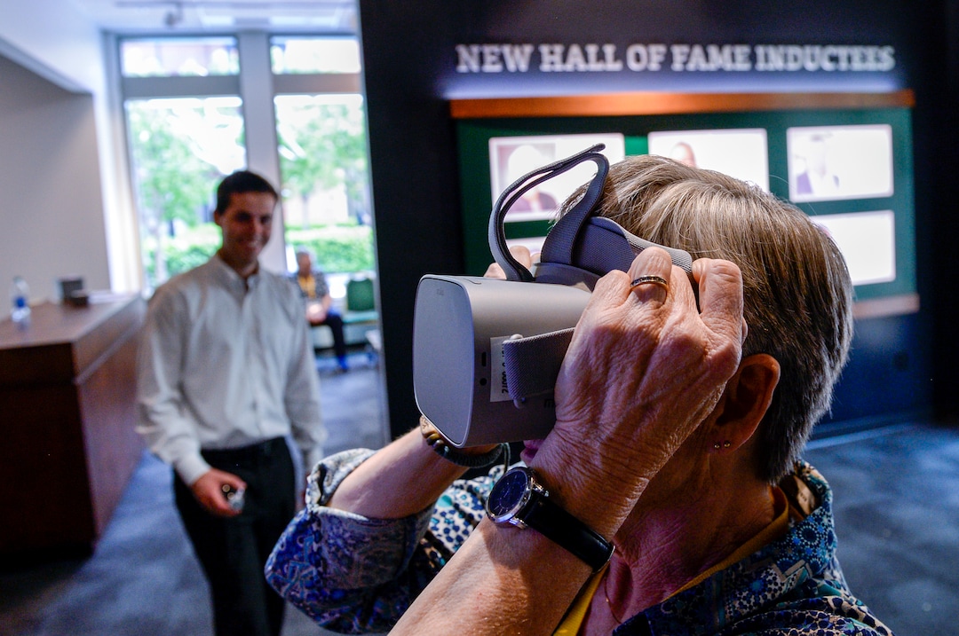 (Leah Hogsten  |  The Salt Lake Tribune)   Susan Rydalch, a Utah Sports Hall of Fame coach inductee of 2007 takes a video interactive luge ride while touring the new Utah Sports Hall of Fame museum, Wednesday, May 15, 2019. Rydalch, a former volleyball coach at Tooele High School is honored by the sports hall of fame, along with her husband Ron Rydalch, a former Bears football player who was inducted in 2019.