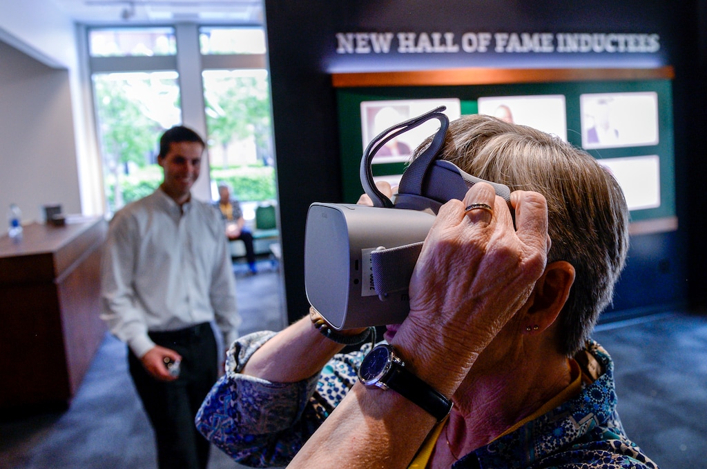 (Leah Hogsten | The Salt Lake Tribune) Susan Rydalch, a Utah Sports Hall of Fame coach inductee of 2007 takes a video interactive luge ride while touring the new Utah Sports Hall of Fame museum, Wednesday, May 15, 2019. Rydalch, a former volleyball coach at Tooele High School is honored by the sports hall of fame, along with her husband Ron Rydalch, a former Bears football player who was inducted in 2019.