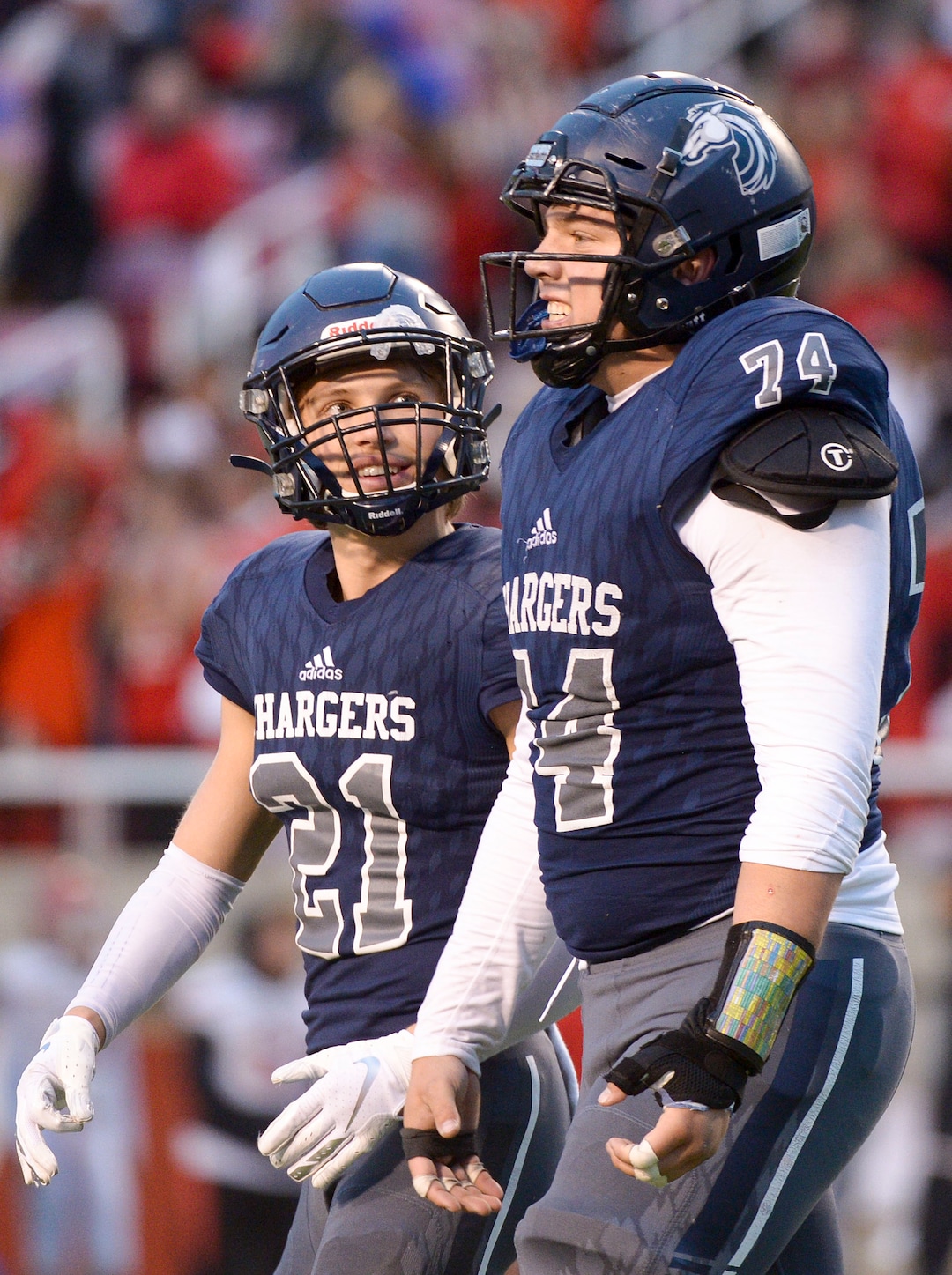 (Leah Hogsten  |  The Salt Lake Tribune)  Corner CanyonÕs Andrew McDonald celebrates the win with Jackson Light. Corner Canyon High School defeated American Fork High School 49-14 during the 6A State Championship football title, Nov. 22, 2019 at Rice-Eccles Stadium.