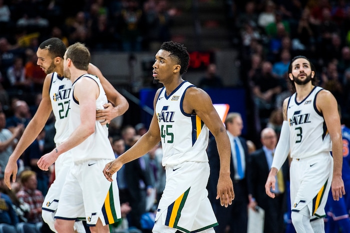 (Chris Detrick  |  The Salt Lake Tribune)  Utah Jazz guard Donovan Mitchell (45) Utah Jazz center Rudy Gobert (27) Utah Jazz forward Joe Ingles (2) and Utah Jazz guard Ricky Rubio (3) walk off of the court during the game at Vivint Smart Home Arena Friday, January 19, 2018.  New York Knicks defeated Utah Jazz 117-115.