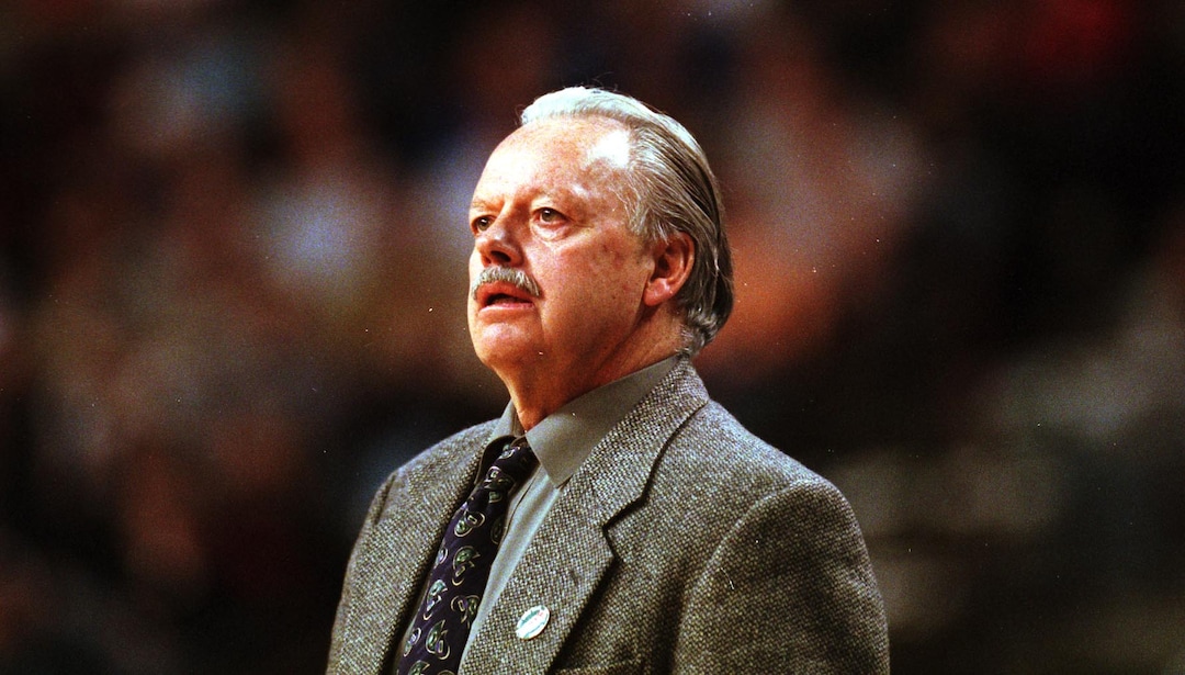 (Tribune file photo)  Former Weber State University basketball coach Ron Abegglen watches his team lose to Florida in the second round of the NCAA tournament in 1999.
