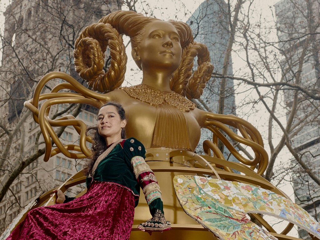 (Vincent Tullo | The New York Times)

The artist Shahzia Sikander with her work — Witness — in Madison Square Park in New York, Jan. 21, 2023.