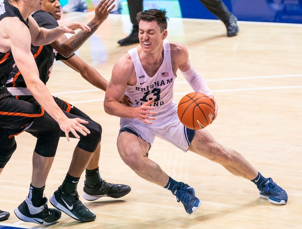 (Rick Egan | The Salt Lake Tribune) Brigham Young Cougars guard Brandon Averette (4) dribbles the ball up the middle, as Pacific Tigers guard Daniss Jenkins (4) defends, in basketball action at the Marriott Center in Provo, on Saturday, Jan. 30, 2021.