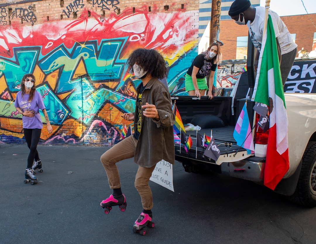 (Rick Egan | The Salt Lake Tribune)  Zachary Taylor skates and dances for the camera during a Dance Dance 4 Revolution virtual protest on Nov. 1, 2020. Because of the jump in Covid-19 cases, organizers for Ourstreets and Dance Dance 4 Revolution streamed their virtual "March to the Polls" event from a back alley in Salt Lake City, Sunday.