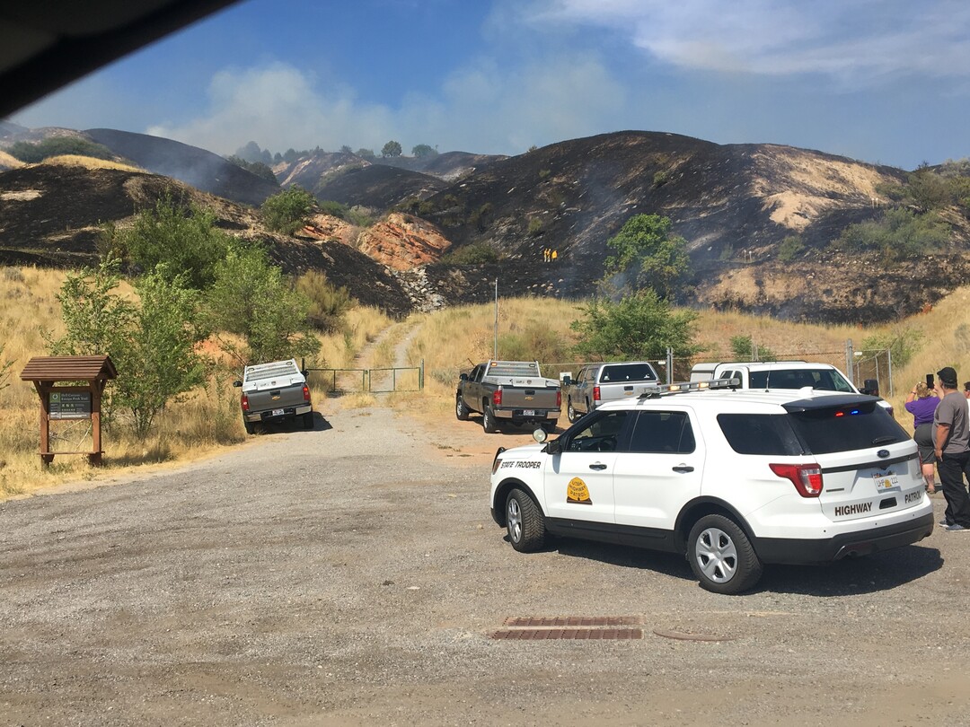 (James Semerad | For The Tribune) Hills are scarred by a fire near the Utah Capitol on Tuesday, July 24, 2018.