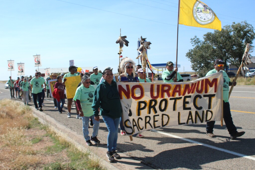 (Sofia Fisher) Members of the Ute Mountain Ute Tribe and allies marched north on Highway 191 Saturday morning to the tune of guitar strums, drumbeats and the occasional supportive honk from a passing car.