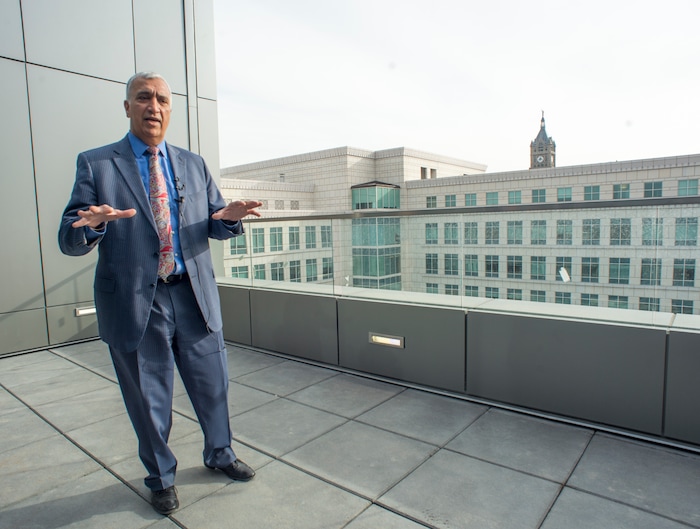 (Rick Egan  |  The Salt Lake Tribune)    Sim Gill, Salt Lake County District Attorney, talks about all the windows and natural light in the new Salt Lake County District Attorney building in Salt Lake City, Friday, March 9, 2018.


