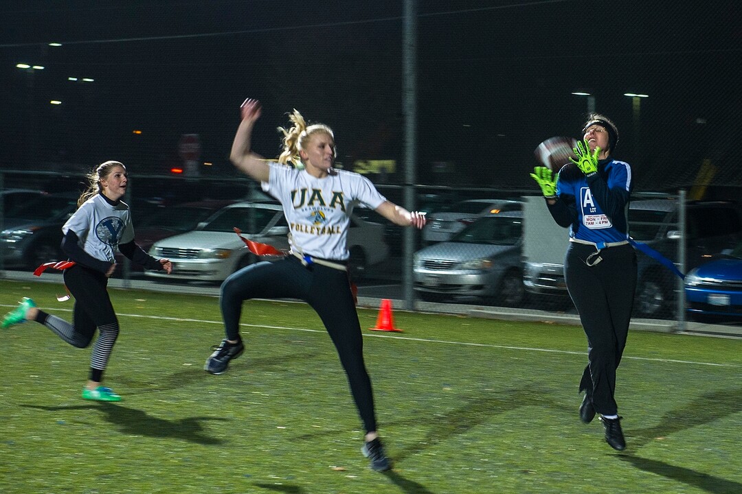 (Chris Detrick  |  The Salt Lake Tribune) Team A Lot's Denise Stephens makes a catch during the flag football team game against Sim Team at North University Fields in Provo Thursday, November 30, 2017.  