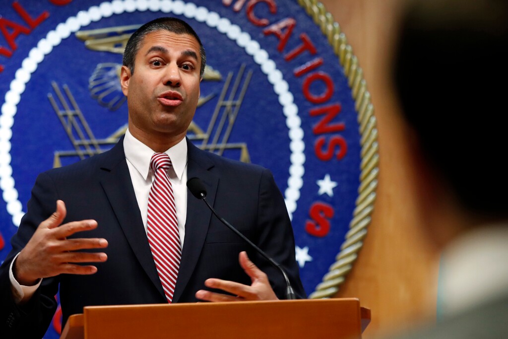 (Jacquelyn Martin | The Associated Press) After a meeting voting to end net neutrality, Federal Communications Commission (FCC) Chairman Ajit Pai answers a question from a reporter, Thursday, Dec. 14, 2017, in Washington.