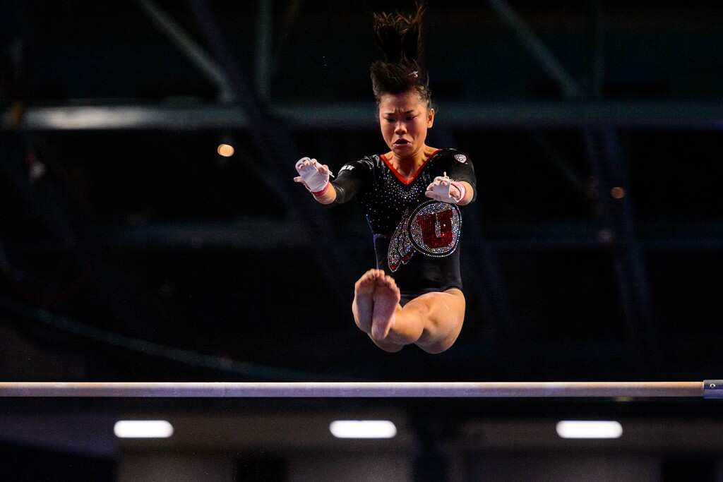 (Trent Nelson  |  The Salt Lake Tribune) Utah's Kim Tessen on the bars at the Best of Utah NCAA Gymnastics Meet in West Valley City on Saturday, Jan. 11, 2020.