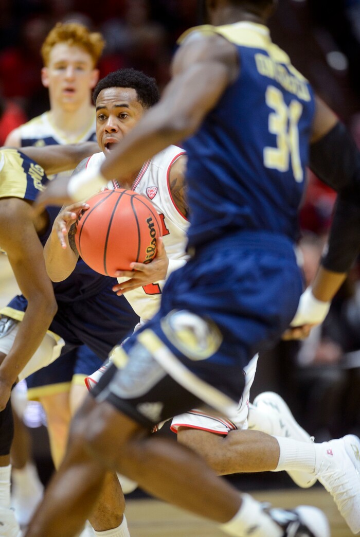 (Steve Griffin  |  The Salt Lake Tribune)  Utah Utes guard Justin Bibbins (1) drives through traffic during the Utah versus UC Davis men's NIT basketball game at the Huntsman Center in Salt Lake City Wednesday March 14, 2018.