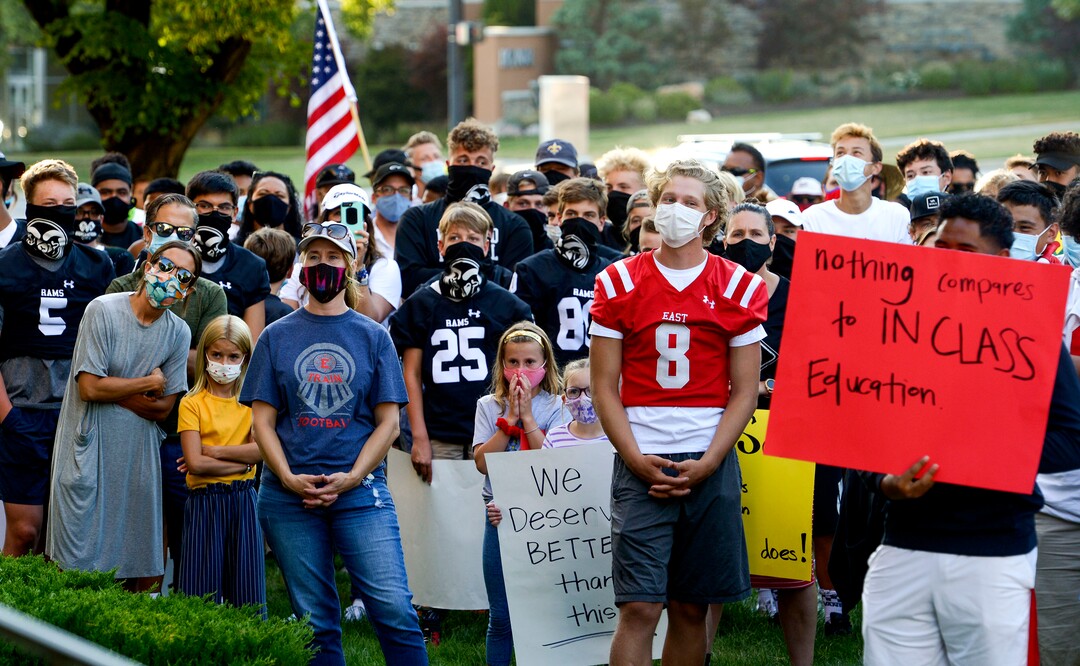 (Leah Hogsten  |  The Salt Lake Tribune) Parents and students within the Salt Lake City School District rally for K-12 students to return in-person to school this fall, July 15, 2020.