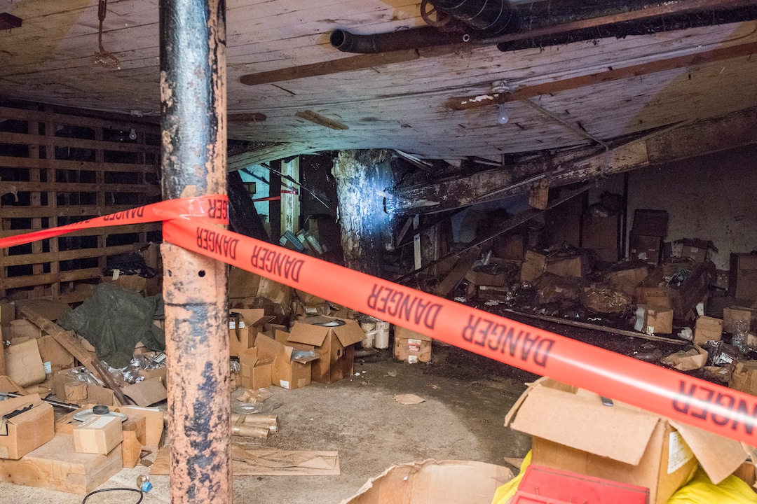 (Briana Scroggins  |  The Utah Investigative Journalism Project) An area of the lower level is blocked off due to water damage collapsing of the ceiling at the Swift building in Ogden on Thursday, May 16, 2019. The EPA started site clean up on April 1 and plan to finish by August 2019.