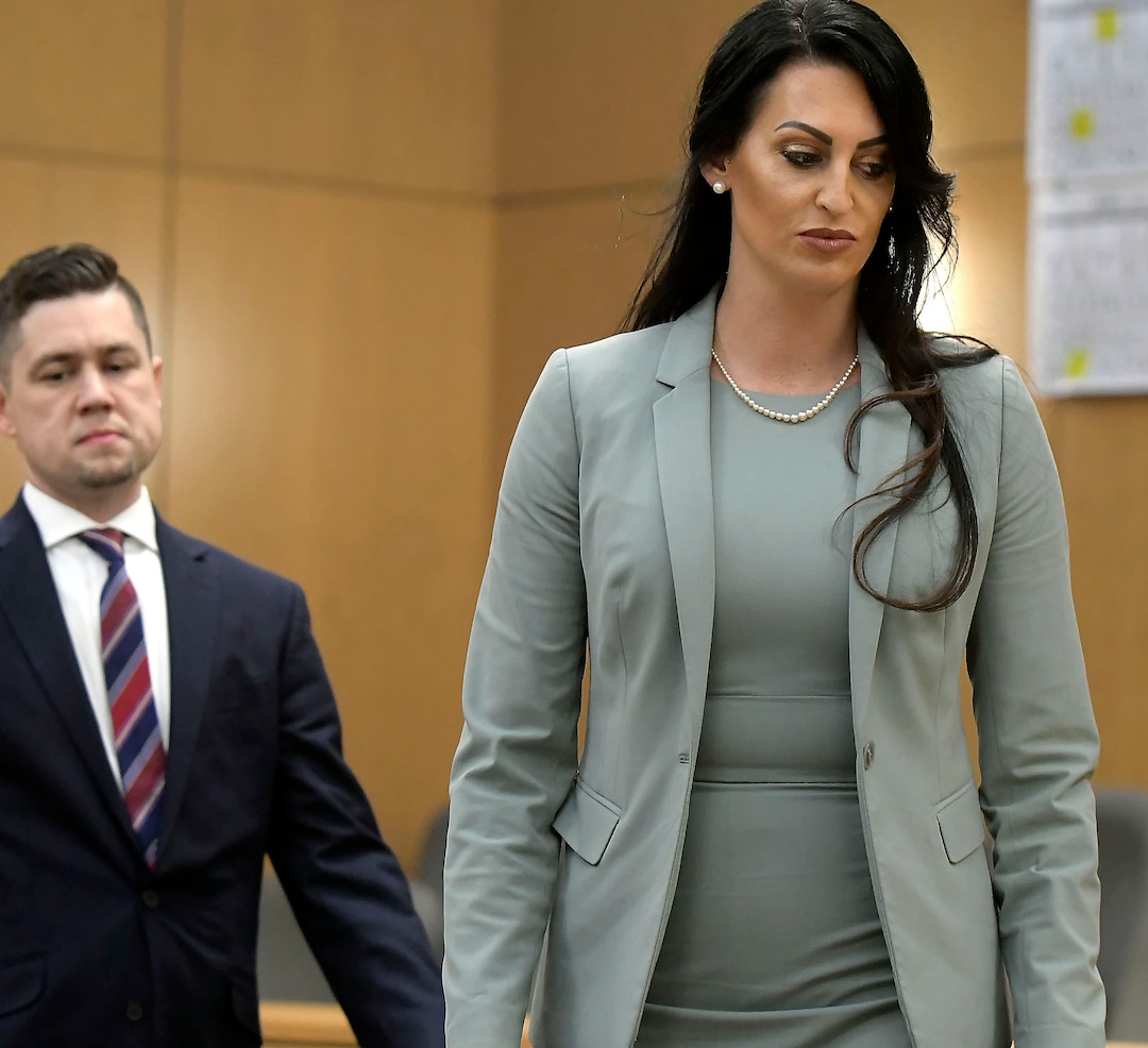 Prosecuting attorney Spencer Walsh, left, and defense attorney Skye Lazaro enter the courtroom after meeting with the judge to discuss when closing arguments might begin in Torrey Green's rape trial, Wednesday, Jan.16, 2019 in Brigham City, Utah. Green is accused of raping multiple women while he was a football player at Utah State University. (Eli Lucero/Herald Journal via AP)