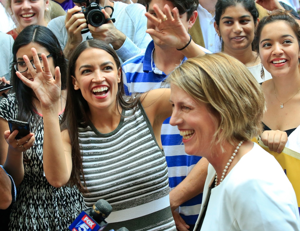 FILE - In this July 12, 2018, file photo, Alexandria Ocasio-Cortez, left, the surprise winner in the congressional race who unseated 20-year incumbent Joe Crowley in New York's Congressional District 14, stands next to Zephyr Teachout, after endorsing her candidacy for Attorney General during a news conference in New York. The Democratic party’s newest star, New York City congressional candidate Alexandra Ocasio-Cortez, visited the Capitol on July 24, to meet with lawmakers who may soon be colleagues. (AP Photo/Bebeto Matthews, File)