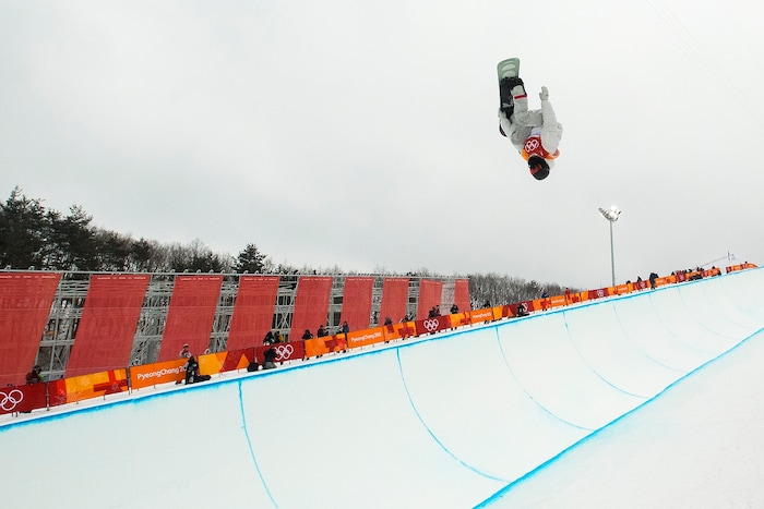 (Chris Detrick  |  The Salt Lake Tribune)  Shaun White competes during the men's halfpipe finals at Phoenix Snow Park during the Pyeongchang 2018 Winter Olympics Wednesday, Feb. 14, 2018.  White won the event with a 97.75, his third Olympic gold medal in the halfpipe (2006, 2010, 2018).