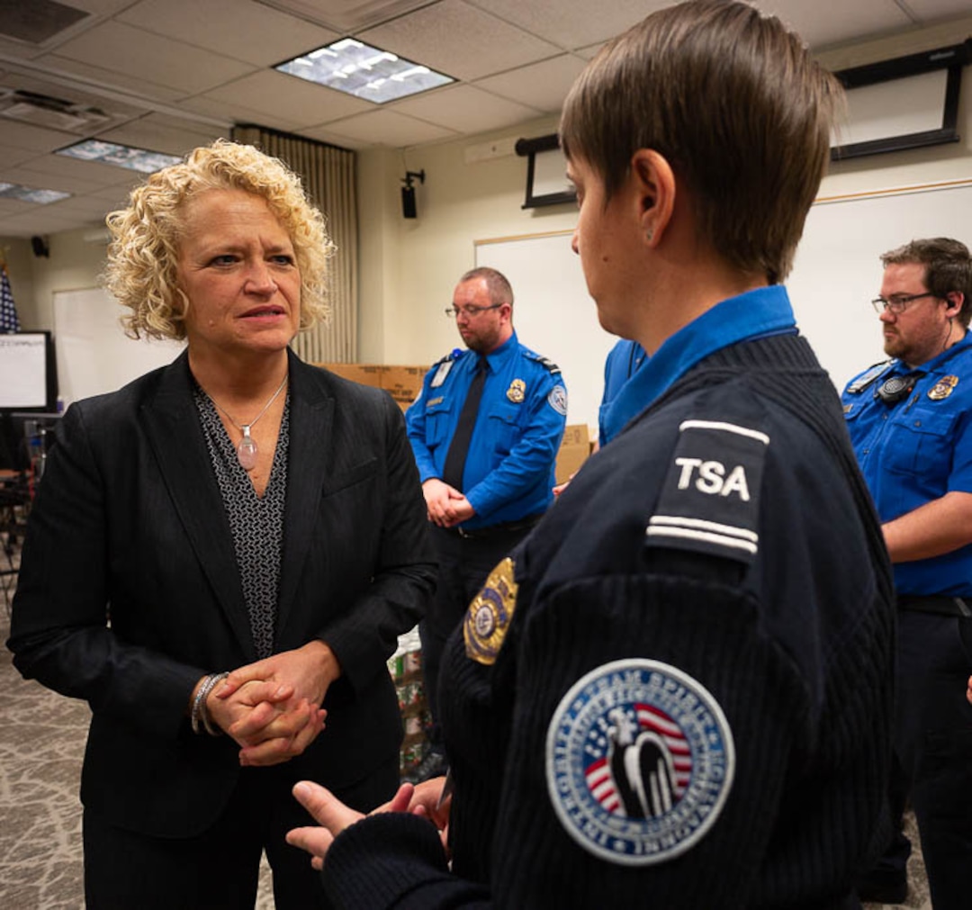 (Trent Nelson | The Salt Lake Tribune)  Salt Lake City Mayor Jackie Biskupski speaks to TSA employee Woodrina Berg. Biskupski had pizza delivered to TSA and other federal employees to thank them for working at the airport without pay during the partial federal shutdown on Tuesday Jan. 22, 2019. Food from the Utah Food Pantry was stacked around the training room to cover the needs of employees.