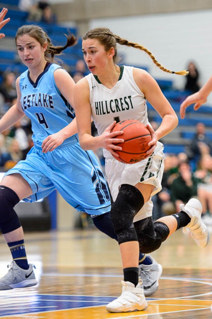 (Trent Nelson | The Salt Lake Tribune)  Hillcrest's Gabrielle Desjardins (1) drives on Westlake's Ashley Parry (4) as Hillcrest faces Westlake in the 6A High School Girls' Basketball Tournament at SLCC in Taylorsville, Thursday Feb. 22, 2018.