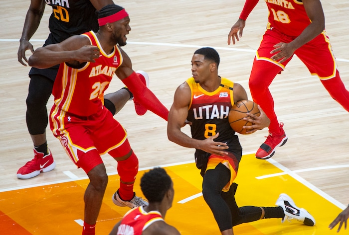 (Rick Egan | The Salt Lake Tribune) Utah Jazz guard Shaquille Harrison (8) takes the ball up the middle as Atlanta Hawks forward Bruno Fernando (24) defends, in NBA action between the Utah Jazz and the Atlanta Hawks at Vivint Arena, on Friday, Jan. 15, 2021.