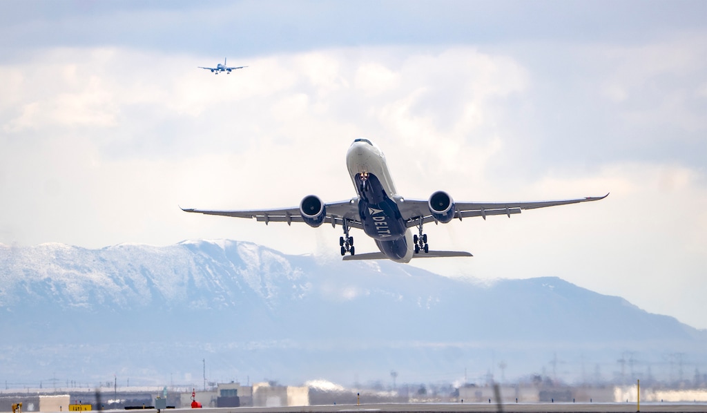 (Rick Egan | The Salt Lake Tribune)  A plane takes off at Salt Lake City International Airport. Guest columnist Eli McCann recounts a not-so-pleasant landing during a recent flight when his toddler suddenly got sick.