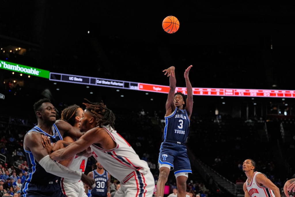 (Charlie Riedel | AP) BYU's AJ Dybantsa (3) shoots during the first half of an NCAA college basketball game against Houston in the quarterfinal round of the Big 12 Conference tournament Thursday, March 12, 2026, in Kansas City, Mo.