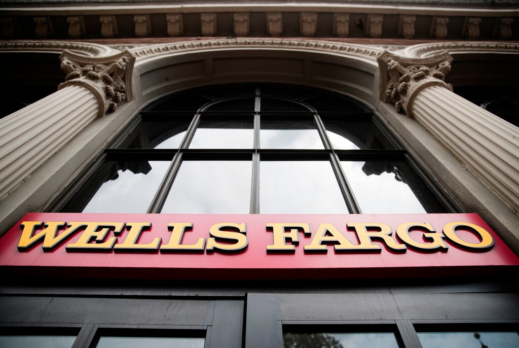 (Matt Rourke | Associated Press file photo) This Friday, Aug. 11, 2017, file photo shows a sign at a Wells Fargo bank location in Philadelphia. Federal regulators are preparing to fine megabank Wells Fargo about $1 billion for misbehavior in its auto and mortgage businesses, according to two people familiar with the negotiations. (AP Photo/, File)