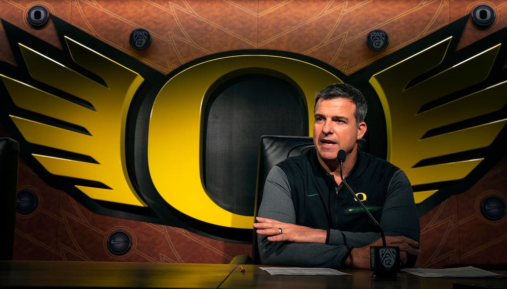 Oregon NCAA college football head coach Mario Cristobal talks to the media on signing day in Eugene, Ore. Wednesday, Feb 6, 2019. (Chris Pietsch/The Register-Guard via AP)