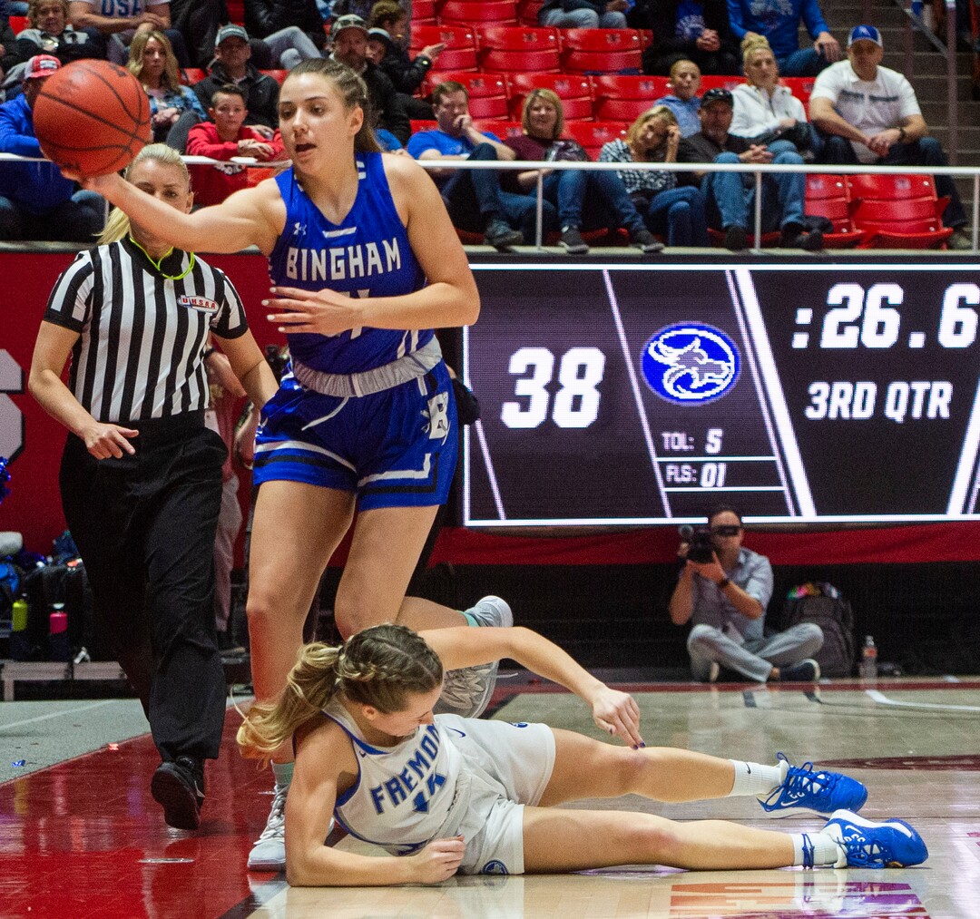(Rick Egan  |  The Salt Lake Tribune)   Bingham Miners Chloe Daniels  (21)  tries to save the ball as she collides with Fremont Sliverwolves Daycee Townsend (14),  in the 6A championship game, between the Fremont Sliverwolves and the Bingham Miners, at the Jon M. Huntsman Center, Saturday Feb. 29, 2020