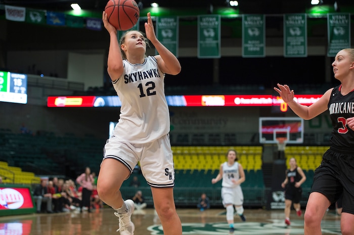 Scott Sommerdorf | The Salt Lake TribuneLauren Gustin drives for two of her 32 points. Salem Hills beat Hurricane 57-35 for the 4A girl's title, Saturday, March 3, 2018.