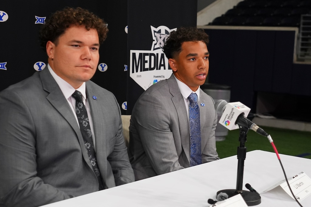 (LM Otero | AP) BYU running back LJ Martin, right, speaks as teammate defensive lineman Keanu Tanuvasa looks on during the Big 12 NCAA college football media days in Frisco, Texas, Tuesday, July 8, 2025.