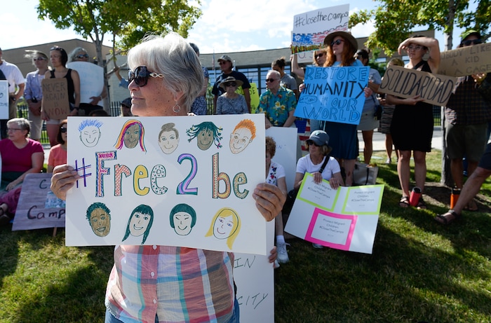 (Francisco Kjolseth  |  The Salt Lake Tribune)  Betsy Smith, joins Utah Jewish Community organizations, their members and friends gathered outside of the U.S. Immigration and Customs Enforcement (ICE) field office at 2975 S. Decker Lake Drive, West Valley City, on Saturday, Aug. 10, 2019, for a Close The Camps vigil.