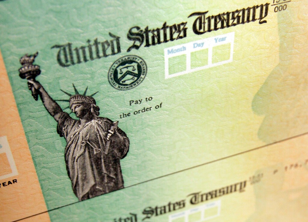 (Matt Rourke | AP file photo) 

This May 8, 2008, photo shows blank checks on an idle press at the Philadelphia Regional Financial Center, which disburses payments on behalf of federal agencies, in Philadelphia.